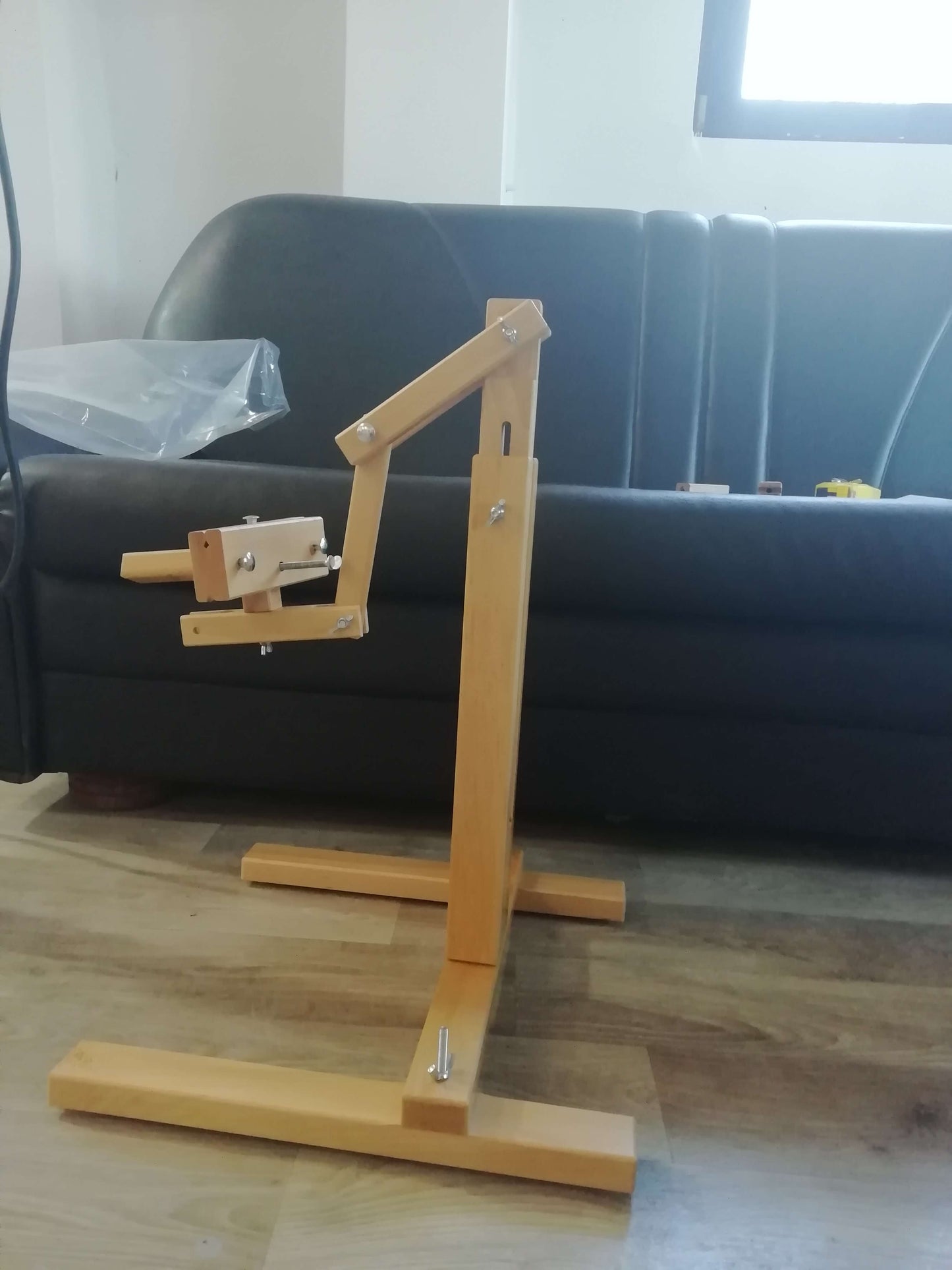 Adjustable stand for needlework